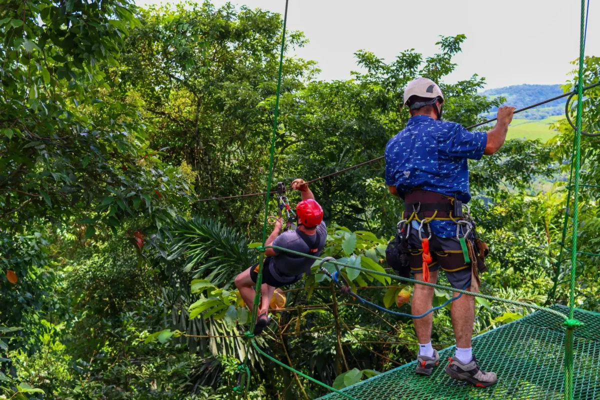 Person ziplining in the rainforest during Canopy Tour La Fortuna near Arenal Volcano, Costa Rica