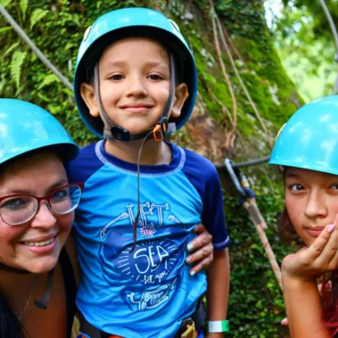 Family enjoying Canopy Tour La Fortuna with kids near Arenal Volcano Costa Rica